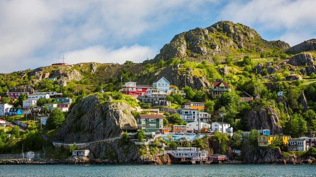 Colourful jellybean houses of The Battery on the rocky hillside above St. John's harbour